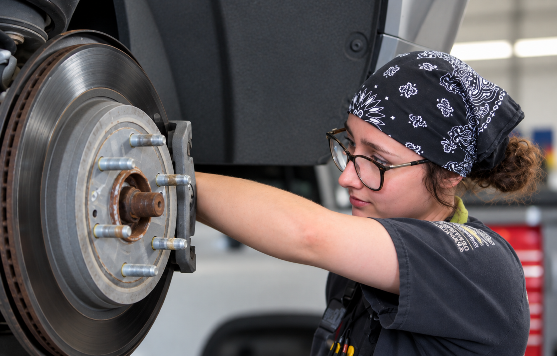 Service employee working on car